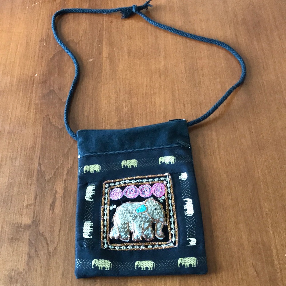 Small shoulder bag made in India with elephant motif, two compartments w zippers